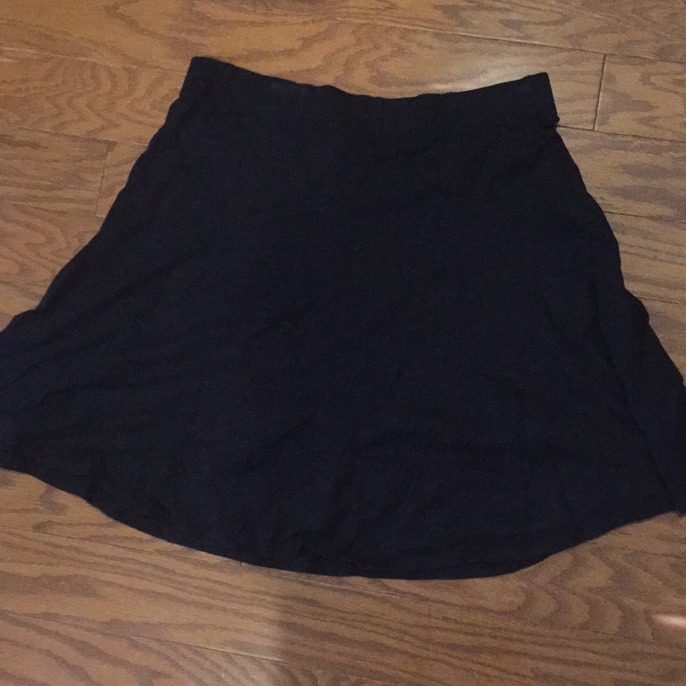 Black flare out shirt.
